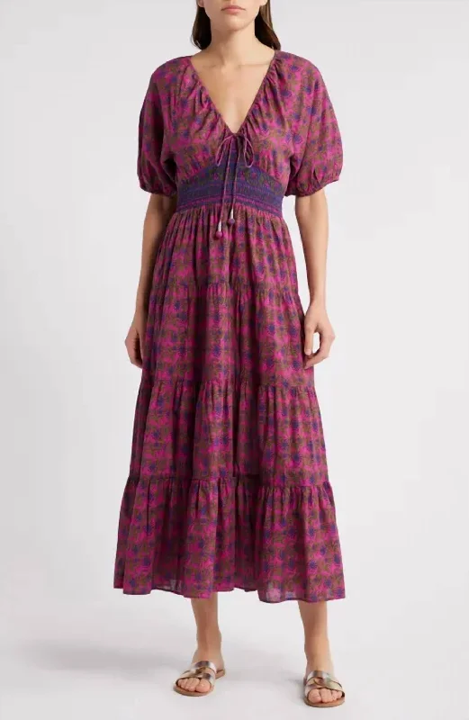 Refresh your wardrobe with stylish women’s outfits   Amyra Block Print Midi Dress In Twisted Vine